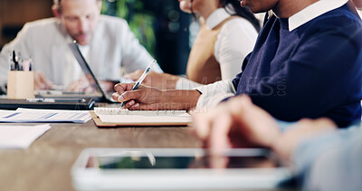 Buy stock photo Hands, team and notebook for meeting in office with writing, proposal or review at real estate agency. People, realtor or consultant with tech for investor, property development or budget insight