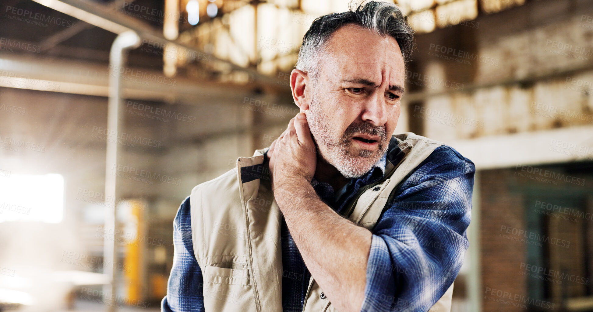 Buy stock photo Carpentry, workshop and man with neck pain for stress, woodworking injury and overworked. Carpenter, supervisor and mature person with strain, inflammation and hurt for pressure, burnout and accident