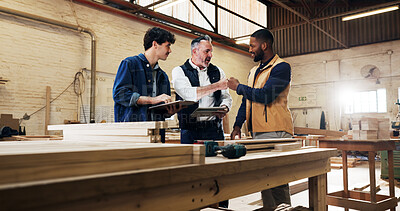 Buy stock photo Carpentry, fist bump and men in meeting in workshop for furniture design, planning and woodworking. Success, carpenter and people with tablet for teamwork, lumber production and building agreement
