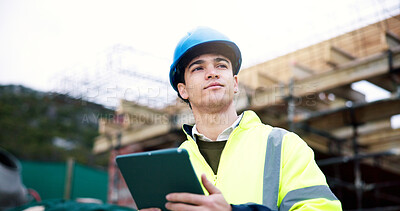 Buy stock photo Man, engineer and planning with tablet at construction site, safety evaluation or project vision. Male person, thinking and architect with tech for building, development or problem solving outdoor