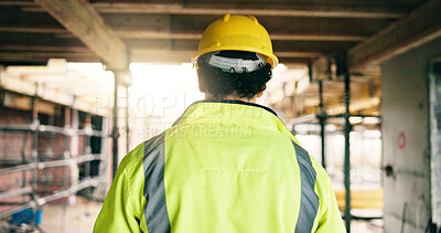 Buy stock photo Back, man and walking on construction site for renovation, scaffolding and building progress with service. Male person, engineering and remodeling project for infrastructure upgrade with helmet