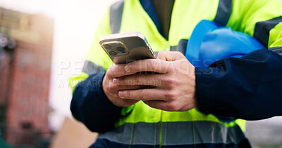 Buy stock photo Architect, online and hands with phone on construction site, texting and communication with contact. Civil engineering, chat and person with mobile, research and property development update on app