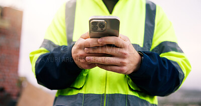 Buy stock photo Architect, message and hands with phone on construction site, online and communication with contact. Civil engineering, chat and person with mobile, real estate and property development update on app