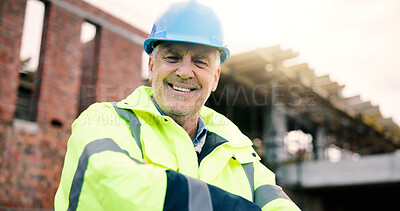 Buy stock photo Construction site, engineer and happy man with arms crossed outdoor for building development with helmet. Confidence, portrait and mature architect with smile, about us or safety inspector with pride