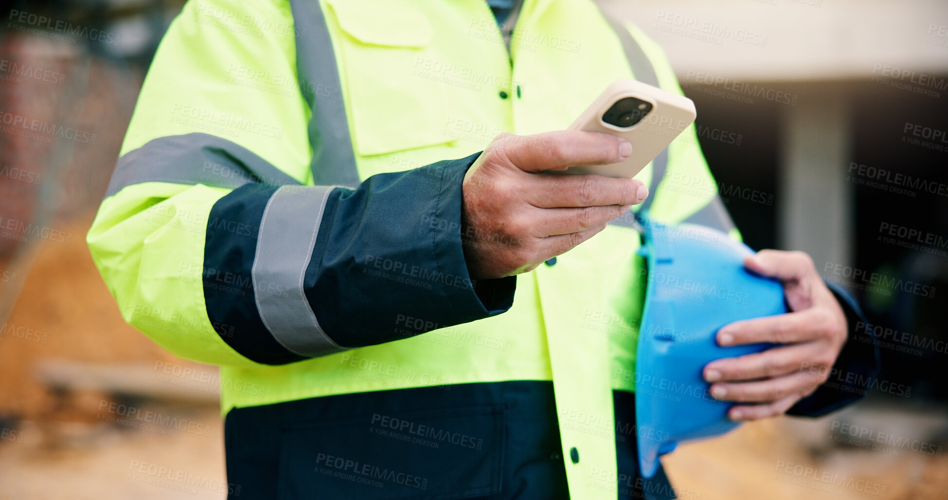 Buy stock photo Civil engineer, online and hands with phone on construction site, chat or communication with contact. Architect, outdoor and person with mobile, texting and property development update on website