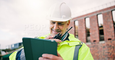 Buy stock photo Radio, happy and construction worker on site with tablet for research on building renovation. Man, planning and mature civil engineer with feedback on maintenance, repairs or property development.