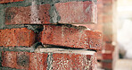 Wall, cement and brick on construction site with damage, civil engineering fail or weak infrastructure. Stone, mortar and incomplete building project with safety hazard, architecture or masonry issue