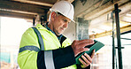 Man, inspection and scroll on construction site with tablet, architecture and project management. Architect, mature person and research in building with tech, infrastructure plan and review design.