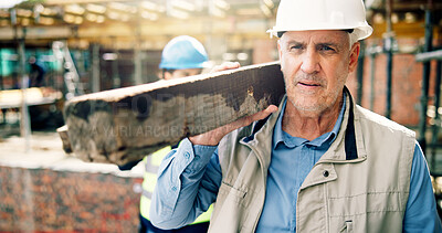 Buy stock photo Thinking, man and construction worker with plank on site for ideas on building, renovation or repairs. Wood beam, planning and mature civil engineer with decision for infrastructure or maintenance.