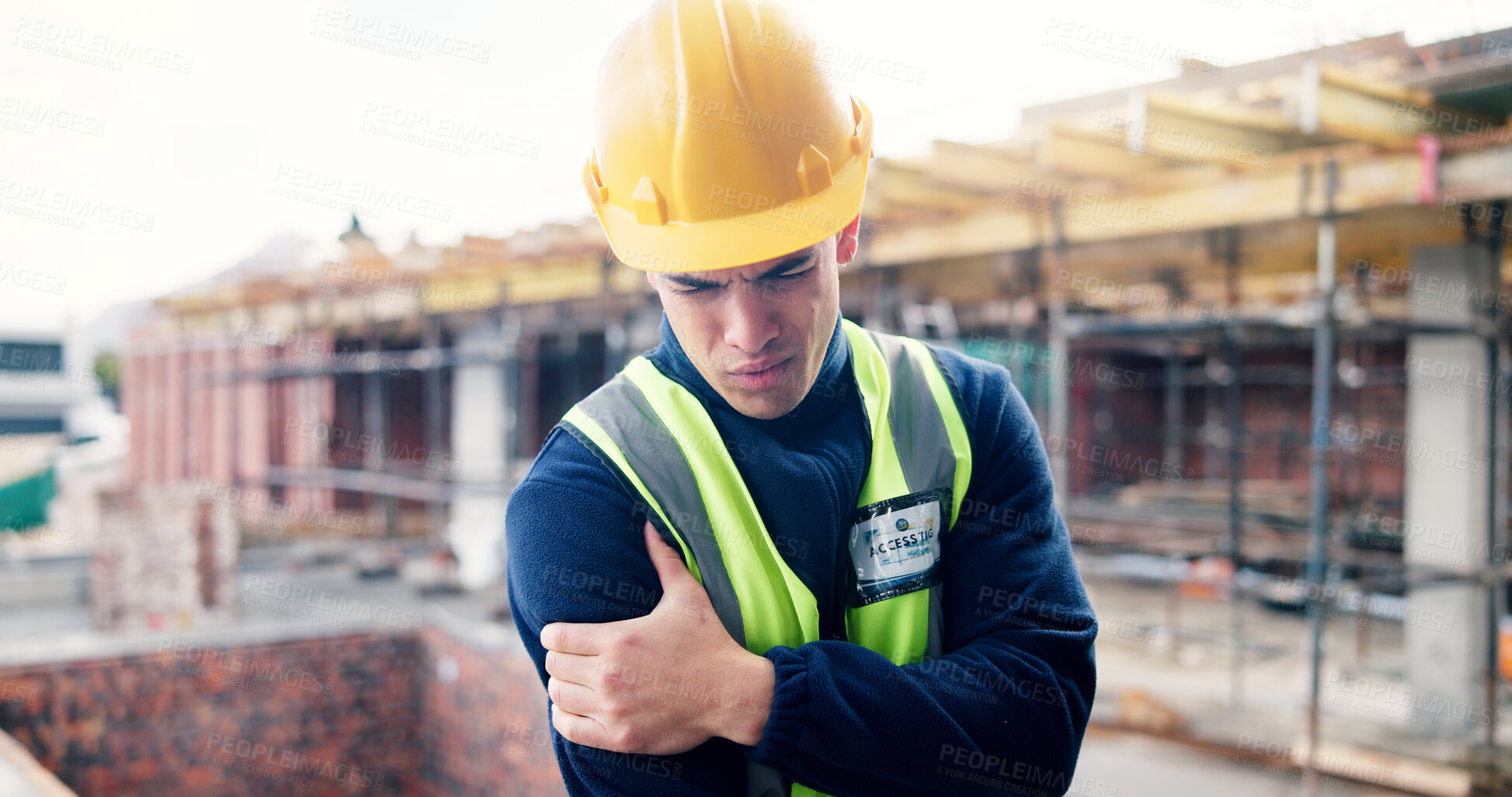 Buy stock photo Construction, stress and man with shoulder pain, accident and workplace injury on site. Contractor, engineering and person with joint ache, strain and hurt for tension, fibromyalgia and pressure