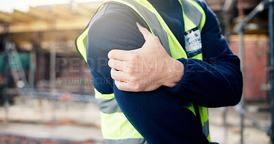 Buy stock photo Construction, stress and hands of man with shoulder pain, accident or workplace injury on site. Contractor, engineering and person with joint ache, strain and hurt for tension, fibromyalgia or sprain