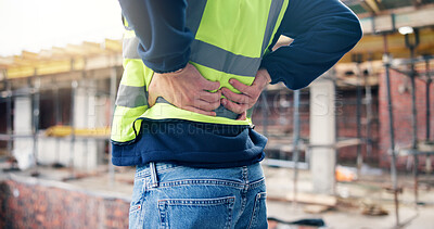 Buy stock photo Back pain, stress and hands of man on construction site with accident, muscle fatigue and tension. Contractor, engineer and person with strain, fibromyalgia and pressure for burnout, posture and hurt