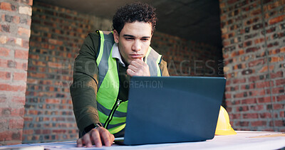 Buy stock photo Architect, man and thinking with laptop in building, renovation or planning for property development. Design, research and person with blueprint, reflection and civil engineering with technology