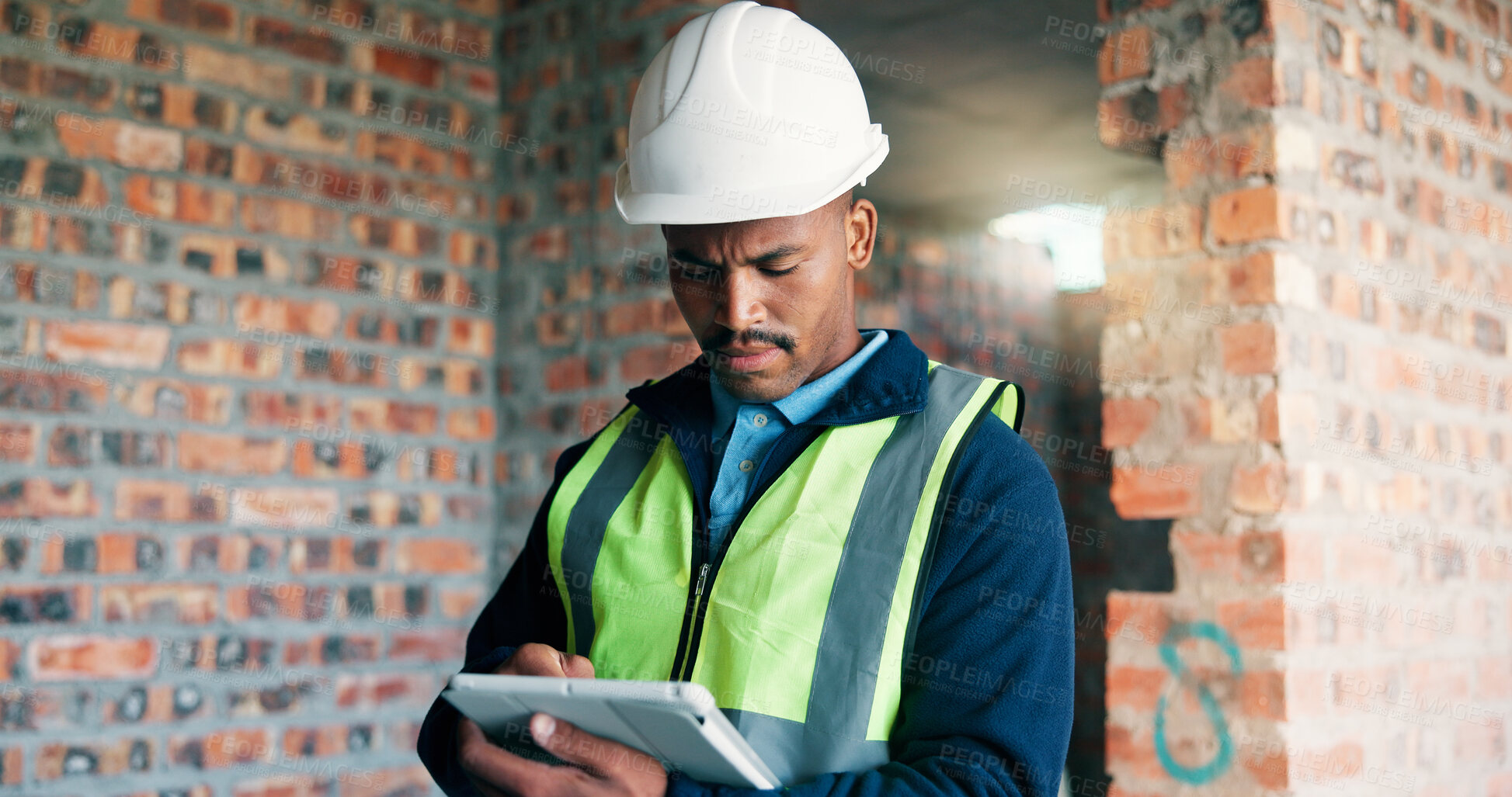 Buy stock photo Black man, tablet or reading at construction site for planning, compliance issue or problem solving. Engineer, tech and worry at worksite for project management, building update and deadline feedback