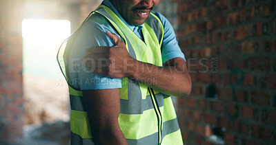 Buy stock photo Building, fatigue and shoulder pain with black man on worksite for engineering or property development. Architecture, industry and injury with construction worker in vest for project management
