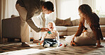 Parents, crying and baby at house with toys, tantrum and emotional support for nurturing toddler. Sad, child and people in home for distraction, sensory overload and teething discomfort for childcare