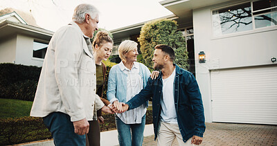 Buy stock photo Real estate, smile and stack of hands with family at new home for celebration or relocation. Congratulations, couple and senior parents in front yard of apartment for property investment or purchase