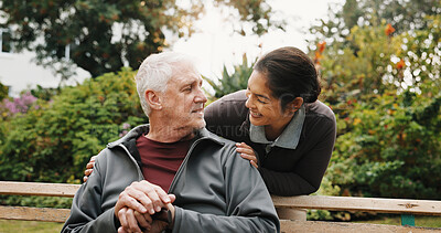 Buy stock photo Care, smile and old man with caregiver on park bench for wellness, rehabilitation and help. Carer, retirement aid and happy person outdoor with cane, connection and assistance for support with trust
