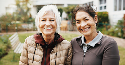 Buy stock photo Support, smile and old woman with caregiver at garden for wellness, rehabilitation and connection. Carer, backyard and portrait of happy people outdoor with trust, care and bonding by retirement home