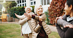 Fitness, stretching and old people outdoor with yoga class, wellness session or training with instructor. Happy, coach or senior women with movement, exercise together or elderly hobby in retirement.