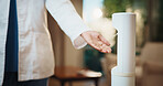 Doctor, hand and sanitizer dispenser in clinic for hygiene, cleaning or healthcare safety protocol. Medical worker, person and disinfectant spray in hospital for disease prevention, germs or bacteria
