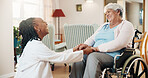 Holding hands, nurse and old woman with disability in wheelchair for checkup or healthcare. Conversation, laughing and support with happy caregiver speaking to senior patient in home for recovery