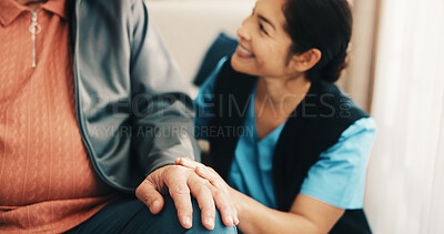 Buy stock photo Hands, caregiver and old person at house with smile, gratitude and kindness for medical advice. Happy, woman and nurse in lounge with senior patient, assisted living and dementia care for wellness