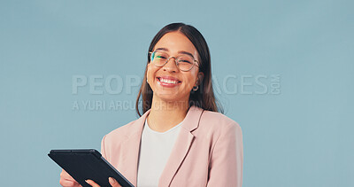 Buy stock photo Portrait, businesswoman and smile in studio with tablet, internet and pride for web design career. Space, happy person and digital designer with tech, glasses and creative job on blue background.