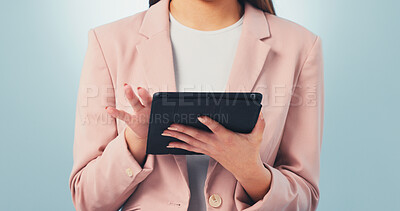 Buy stock photo Businesswoman, hands and internet in studio with tablet, check email and online calendar management. Admin clerk, person and browse with tech, digital schedule and productivity on blue background.