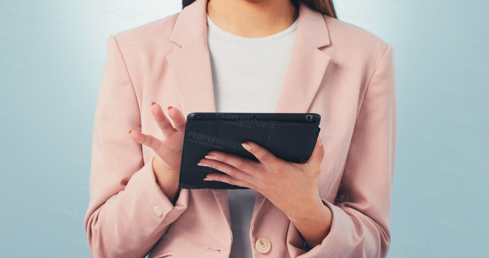 Buy stock photo Businesswoman, hands and internet in studio with tablet, check email and online calendar management. Admin clerk, person and browse with tech, digital schedule and productivity on blue background.