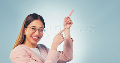 Buy stock photo Woman, laugh and pointing in studio with portrait, advertising and announcement for interview. Smile, mockup space and person with gesture, application and opinion for recruitment on blue background