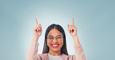 Buy stock photo Business, woman and pointing in studio with smile, advertising and sign up for job interview. Portrait, mockup space and excited with employee, announcement and gesture for hiring on blue background