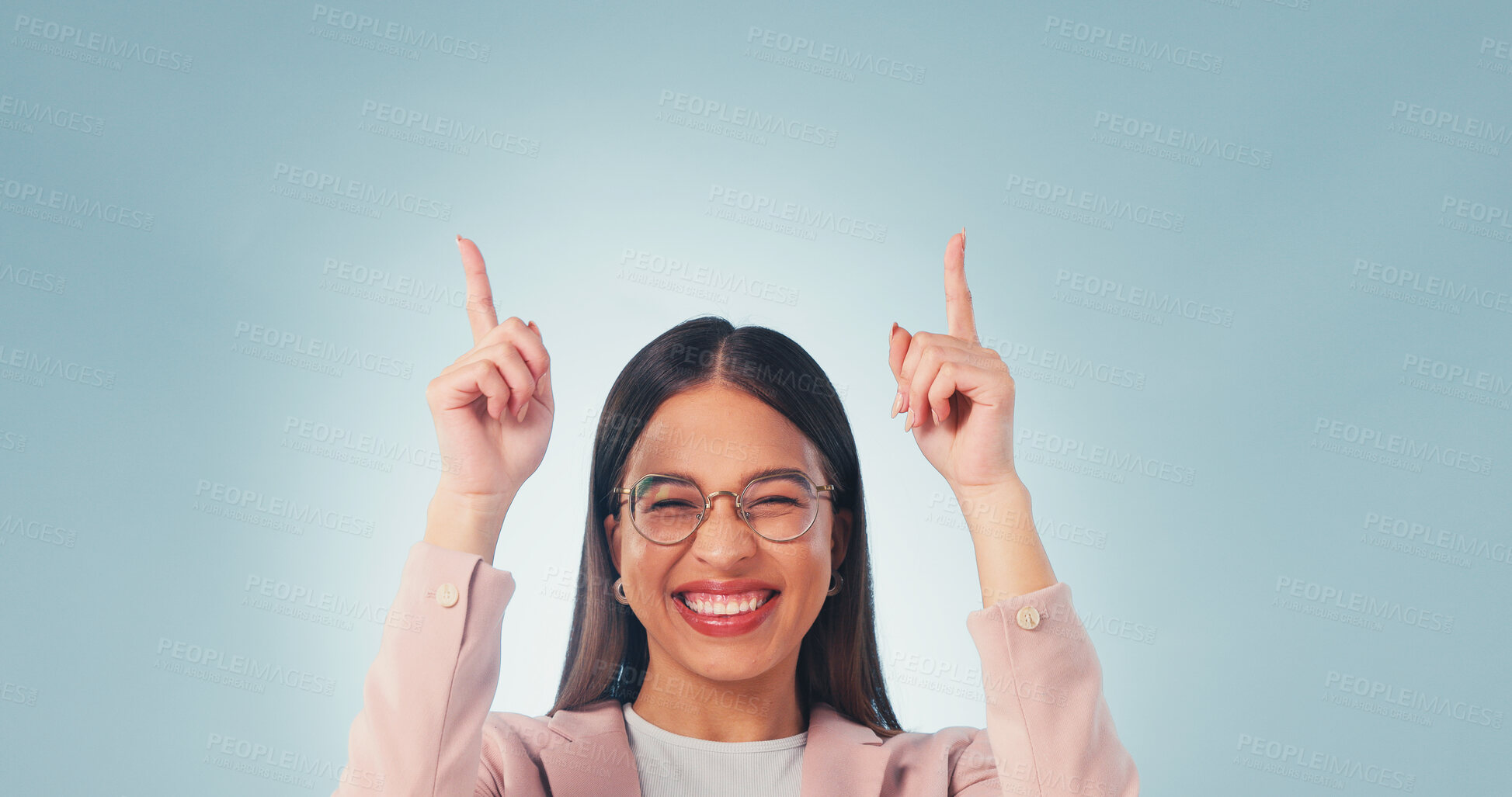 Buy stock photo Business, woman and pointing in studio with smile, advertising and sign up for job interview. Portrait, mockup space and excited with employee, announcement and gesture for hiring on blue background