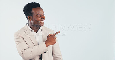 Buy stock photo Happy, business and black man point in studio, advertising and announcement for job interview. Smile, mockup space or person with gesture, application and advisory for recruitment on white background