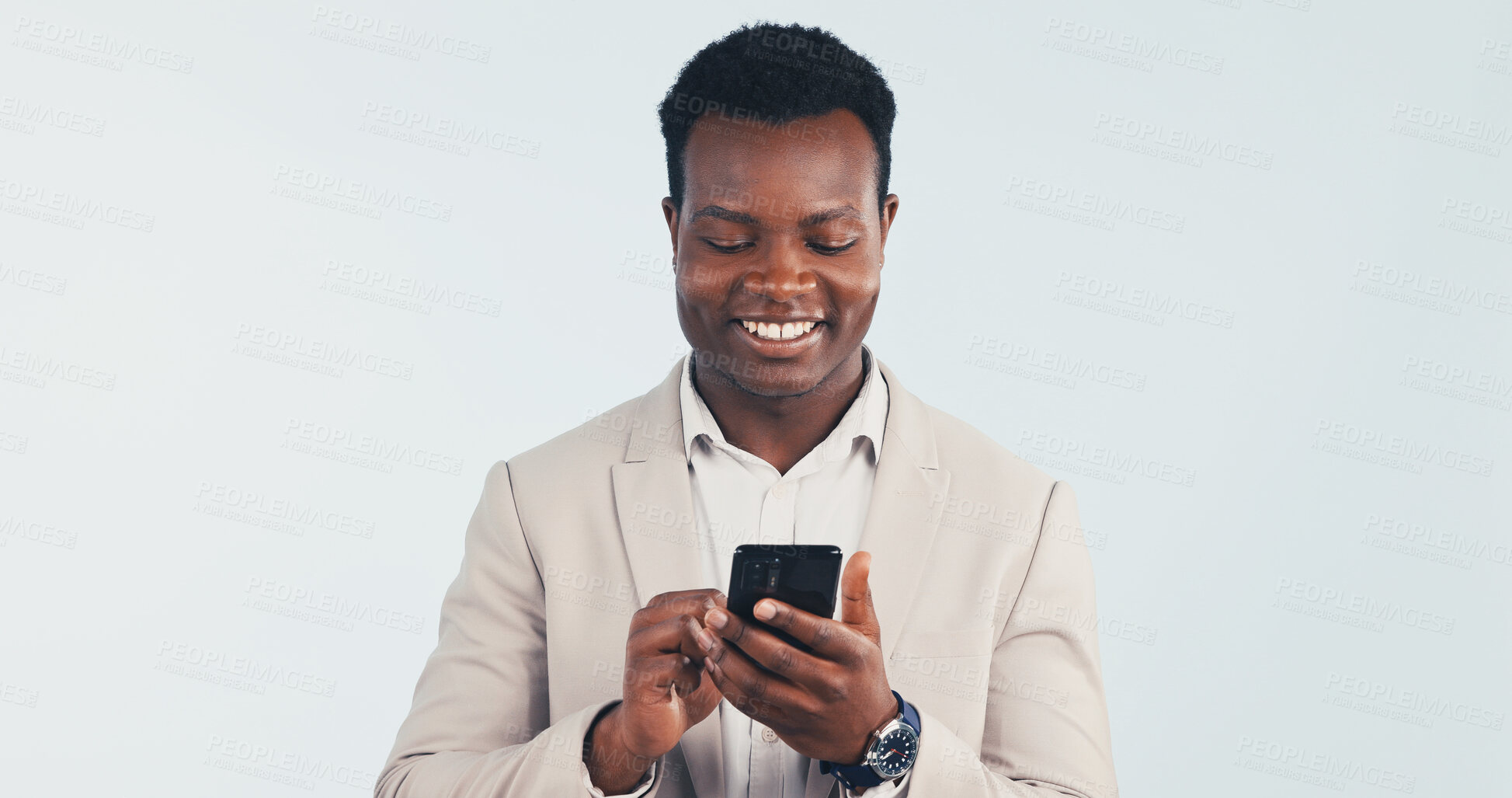 Buy stock photo Happy, businessman and scroll in studio with phone, text message and good news for finance company. Space, black person and financial advisor with tech, app and positive feedback on white background.