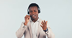 Help, black man and headset for customer service in studio, call center consultant and feedback. Talk, mic and support agent with assistance, contact us and communication with FAQ on white background