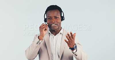 Buy stock photo Help, black man and headset for customer service in studio, call center consultant and feedback. Talk, mic and support agent with assistance, contact us and communication with FAQ on white background