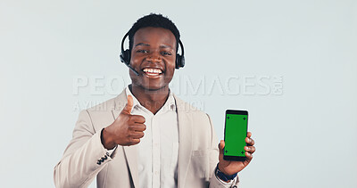 Buy stock photo Green screen, call center or man with thumbs up with phone in studio for crm, mockup or happy. Technical support agent, portrait and black person with cellphone for contact us on white background.