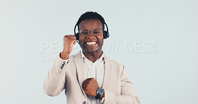 Buy stock photo Fist pump, man or excited with call center agent in studio, target or closing deal for telemarketing. Success, headset and black person with sales achievement, space and portrait on white background