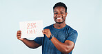 Black man, discount and portrait in studio with poster for advertising, sale and promotion. African person, smile and announcement for retail shopping deal, price info or offer on white background