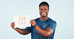 Black man, sale and portrait in studio with poster for advertising, discount and promotion. African person, smile and announcement for retail shopping deal, price info or offer on white background