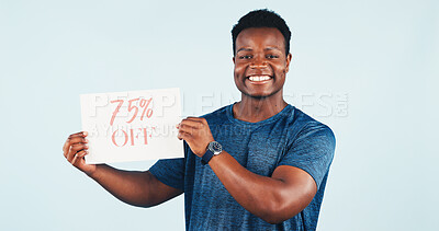 Buy stock photo Black man, sale and portrait in studio with poster for advertising, discount and promotion. African person, smile and announcement for retail shopping deal, price info or offer on white background