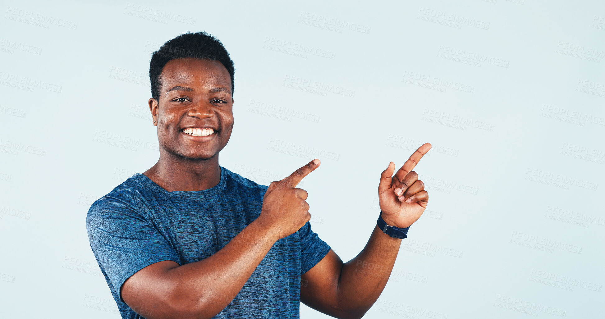 Buy stock photo Black man, smile and pointing in studio with portrait for presentation, product placement or offer. Happy person, mockup space or promotion with news for discount, sale or excited on white background