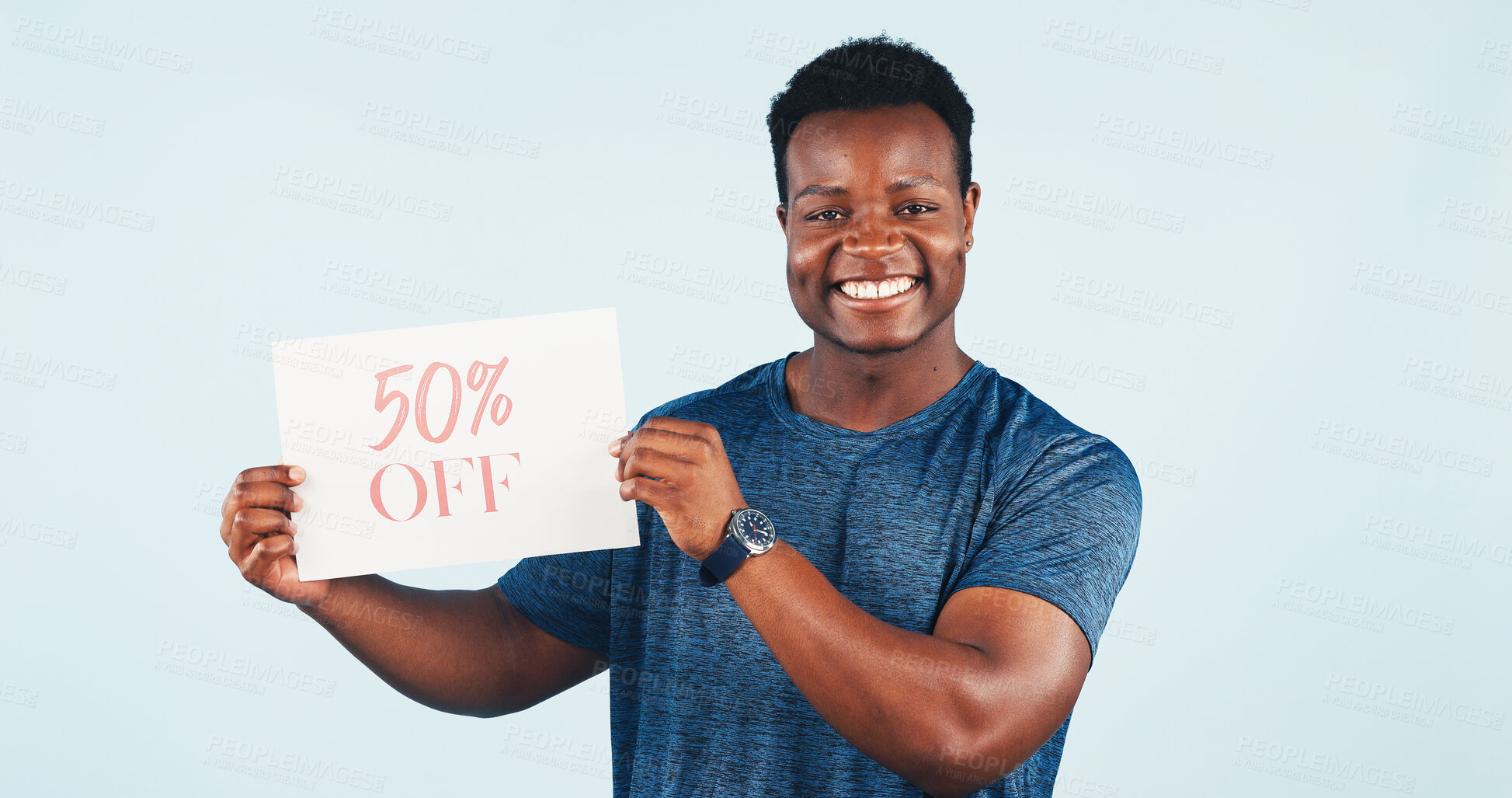 Buy stock photo Black man, promotion and portrait in studio with poster for advertising, discount or sale. African person, smile or announcement for retail shopping deal, half price info or offer on white background