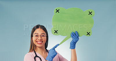 Buy stock photo Medical, portrait or nurse with speech bubble, treatment chat or pointing on wellness info. Smile, woman or doctor with social media poster, recovery feedback or health insight on studio background.