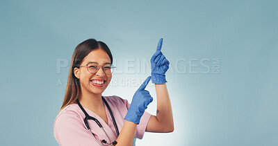 Buy stock photo Medical, portrait or nurse with pointing, recovery list or reminder on wellness information. Mockup space, woman or doctor with instruction, treatment plan or healthcare insight on studio background.
