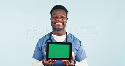 Buy stock photo Green screen, nurse or man with tablet, medical advertising or telehealth on background. Happy black person, tech or healthcare worker with display for mockup space, marketing or portrait in studio