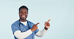 Doctor, portrait and black man in studio pointing for health news, announcement or medical service. Mockup, space and happy person with gesture for healthcare, wellness and info on blue background