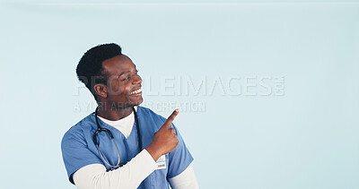 Buy stock photo Happy, nurse and man in studio pointing for health news, announcement and medical service. Mockup, space and African person with gesture for healthcare, wellness tips and info on blue background