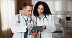 Healthcare, tablet and talking with doctors in hospital together for advice, discussion or feedback. App, collaboration and pointing with medical people in clinic for review, support or wellness